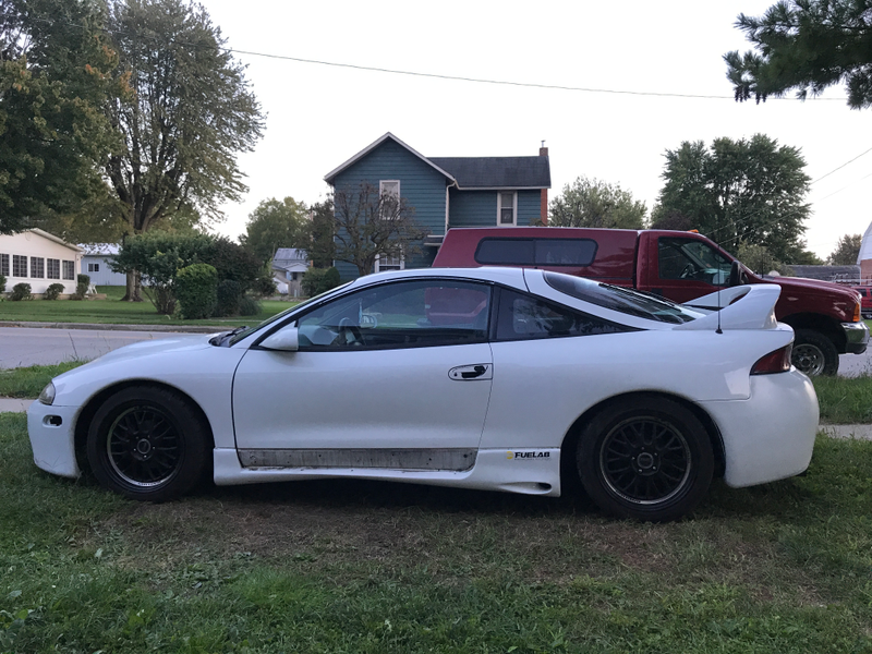 Door skirts being painted. Wheels on, spoiler swapped